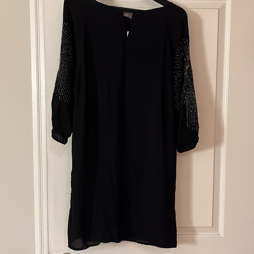 Brand new Wallis black dress with arm detail. Size EU 36.